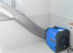 PRED750 Portable Air Scrubber attached to a duct hose