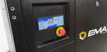 Detailed view of the control interface on the EMAX E3500 Series Industrial Rotary Screw Compressor, including emergency stop button and digital screen.