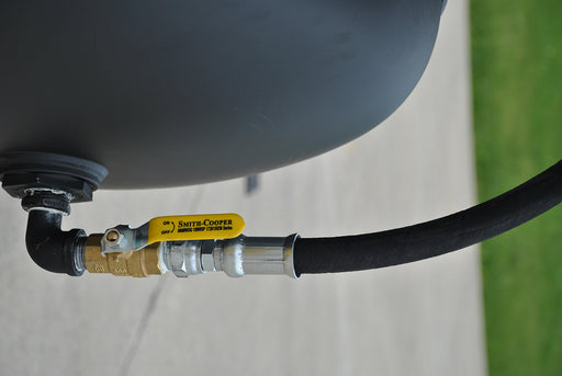 Close-up of the hose connection on the EMAX E4500 Series Rotary Screw Air Compressor, highlighting the Smith-Cooper valve and hose.