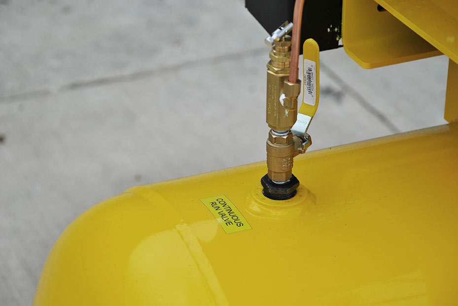 Detailed image of the continuous run valve on the EMAX E450 Series 20hp Industrial Plus Air Compressor, highlighting the ability for extended operation