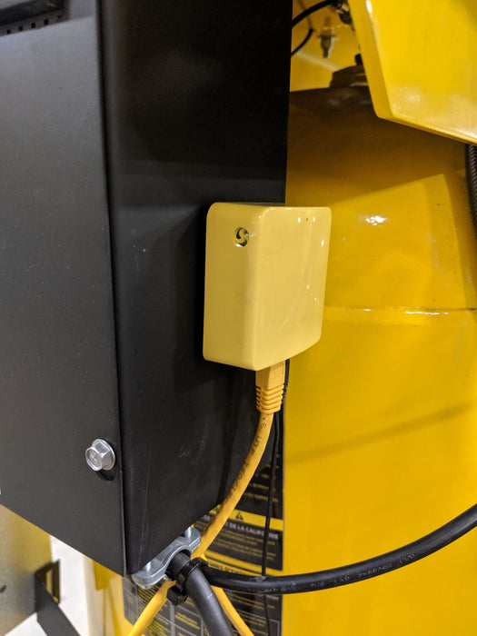 Detail of the compressor connection point on the EMAX E450 Series dual alternating smart air compressors