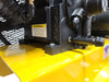 Detailed view of the EMAX E350 Series Air Compressor's warning label and pressure gauge on the yellow tank