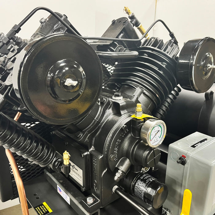 Close up of pressure lubricated piston pump on EMAX E450 SD silent air duplex compressor