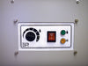 Close-up of EBac Freestar dehumidifier control panel showing humidistat dial, power switch, and status indicator lights